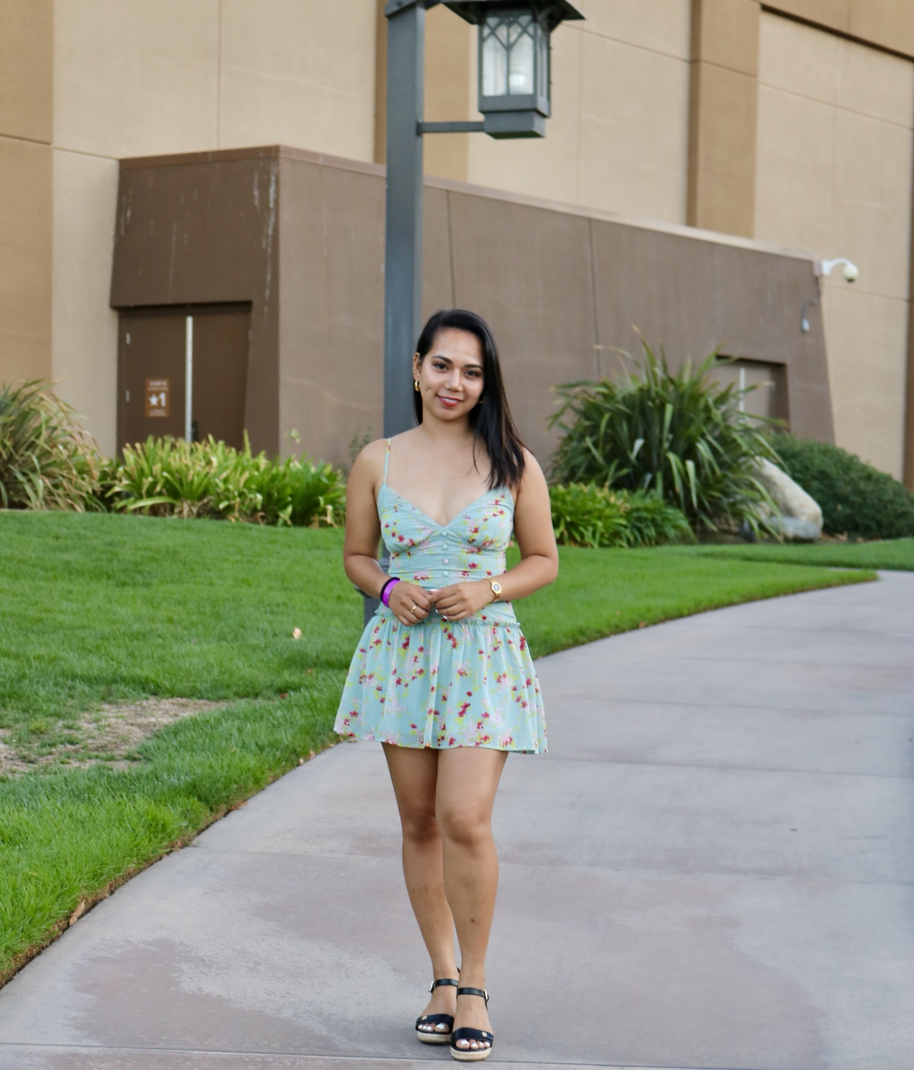 Maribel wearing a floral dress